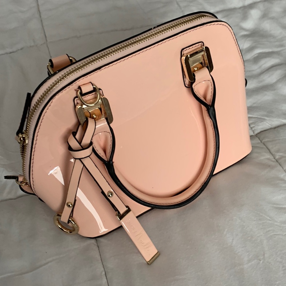 Pink patent purse